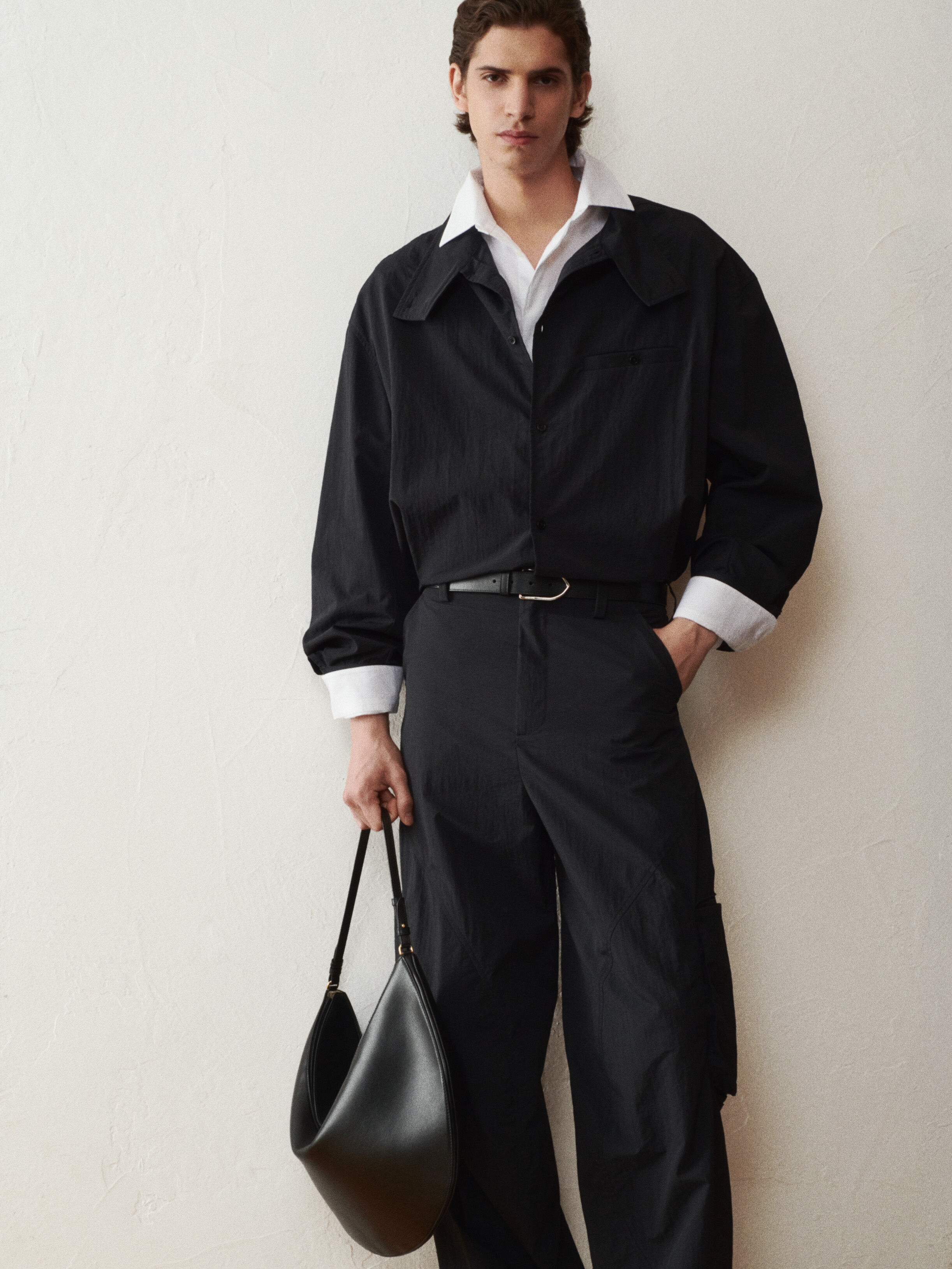 The Ovalo de-Nîmes denim bomber jacket by JACQUEMUS | Official website