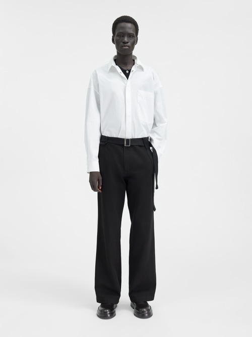 Los pantalones Marrone