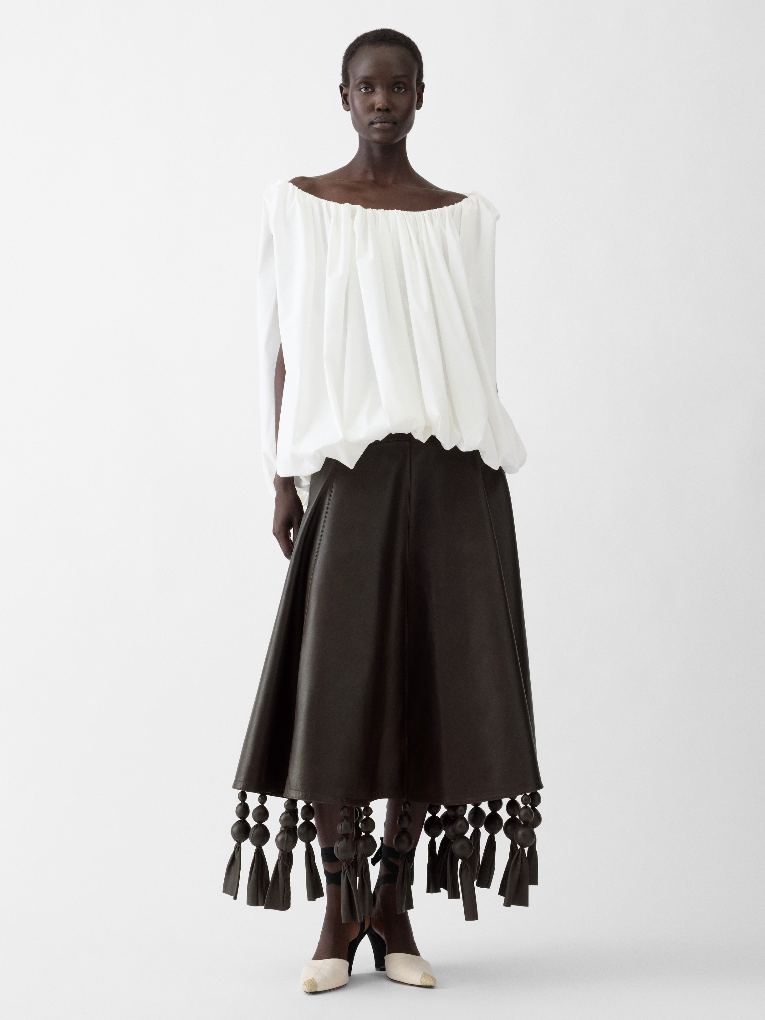 LA JUPE TRIANGLE CUIR