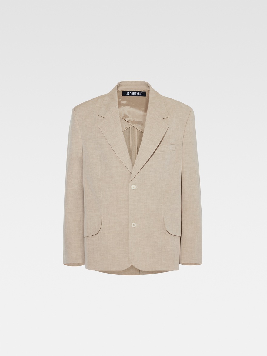 LA VESTE TITOLO