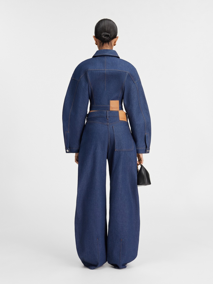 The Ovalo de-Nîmes denim pants by JACQUEMUS | Official website