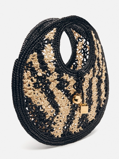 A pequena mala redonda Spiaggia