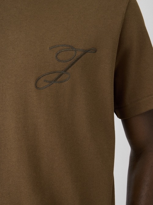 ロゴ入りTシャツ