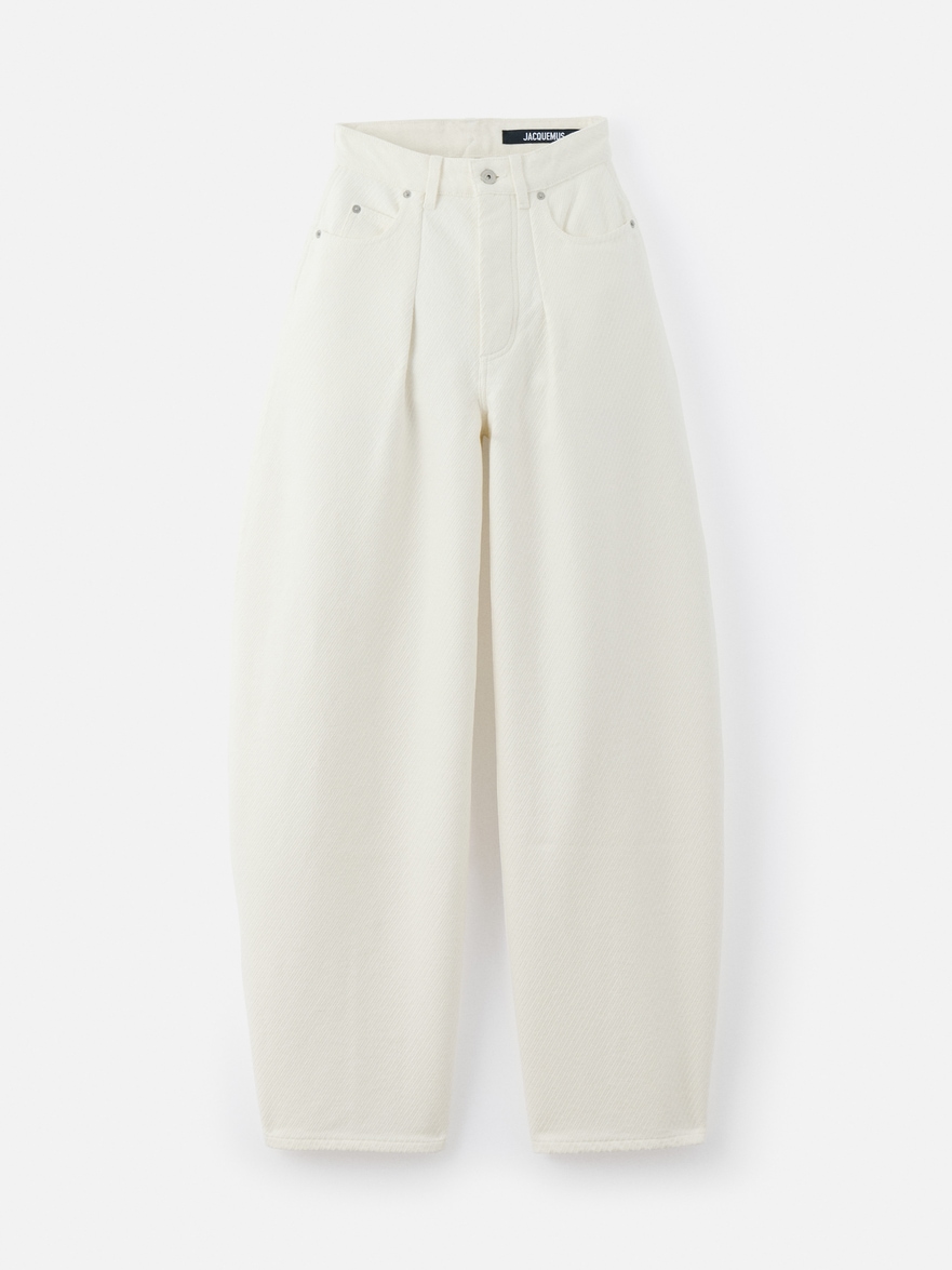The Ovalo de-Nîmes denim pants by Jacquemus