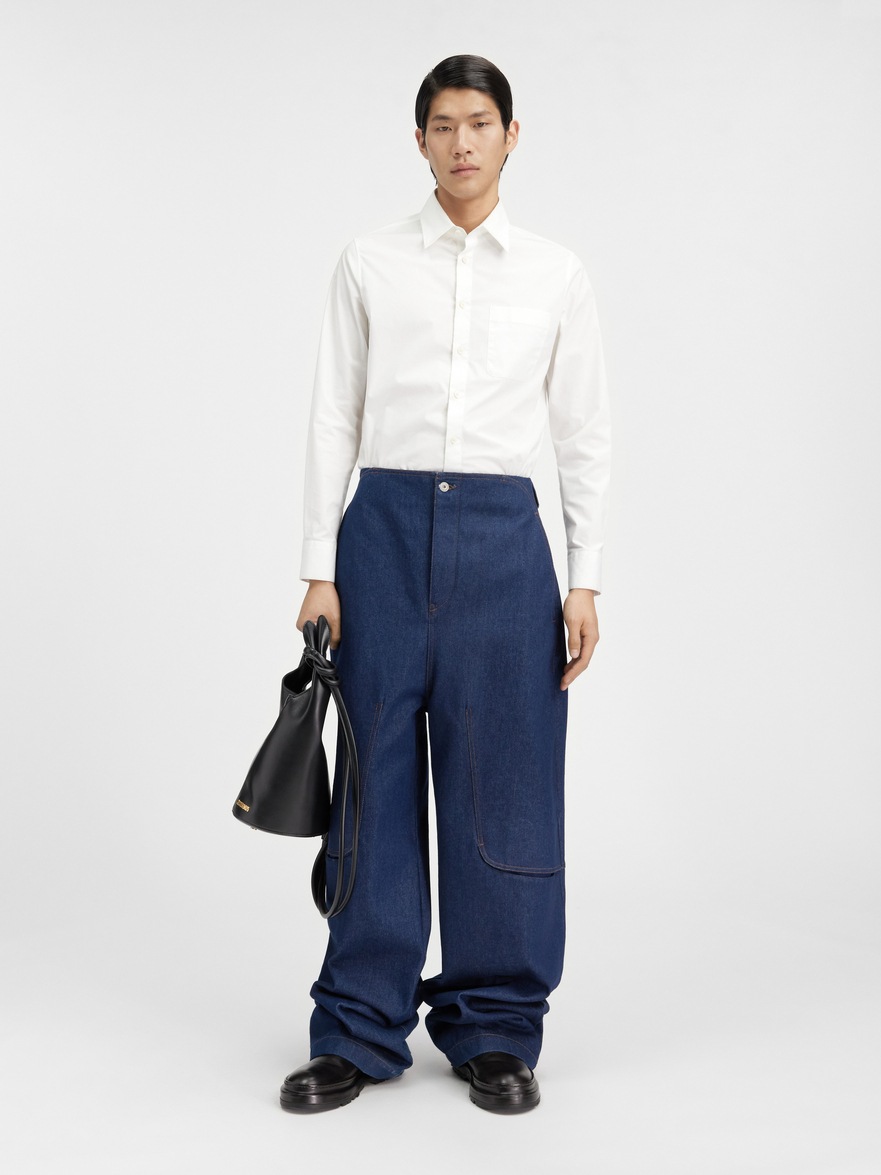 The de-Nîmes Bell denim pants by JACQUEMUS | Official website