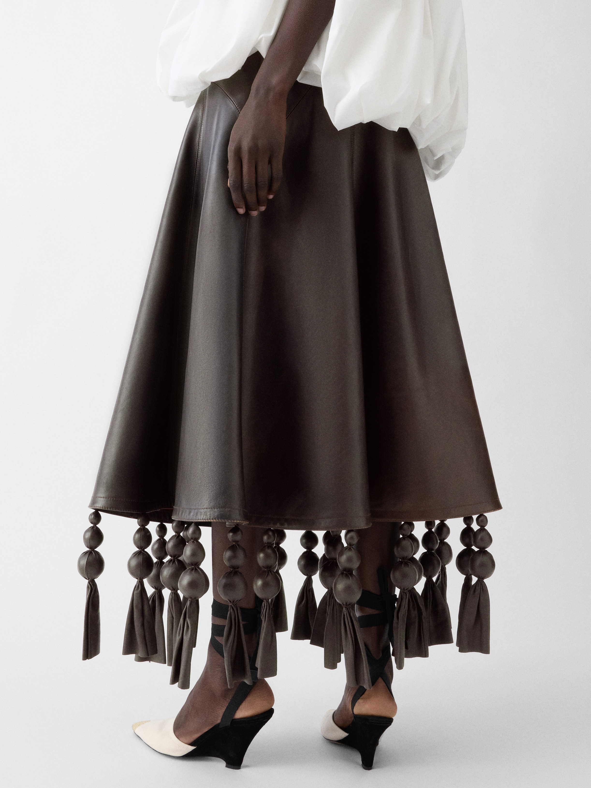 LA JUPE TRIANGLE CUIR