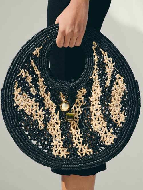 A pequena mala redonda Spiaggia