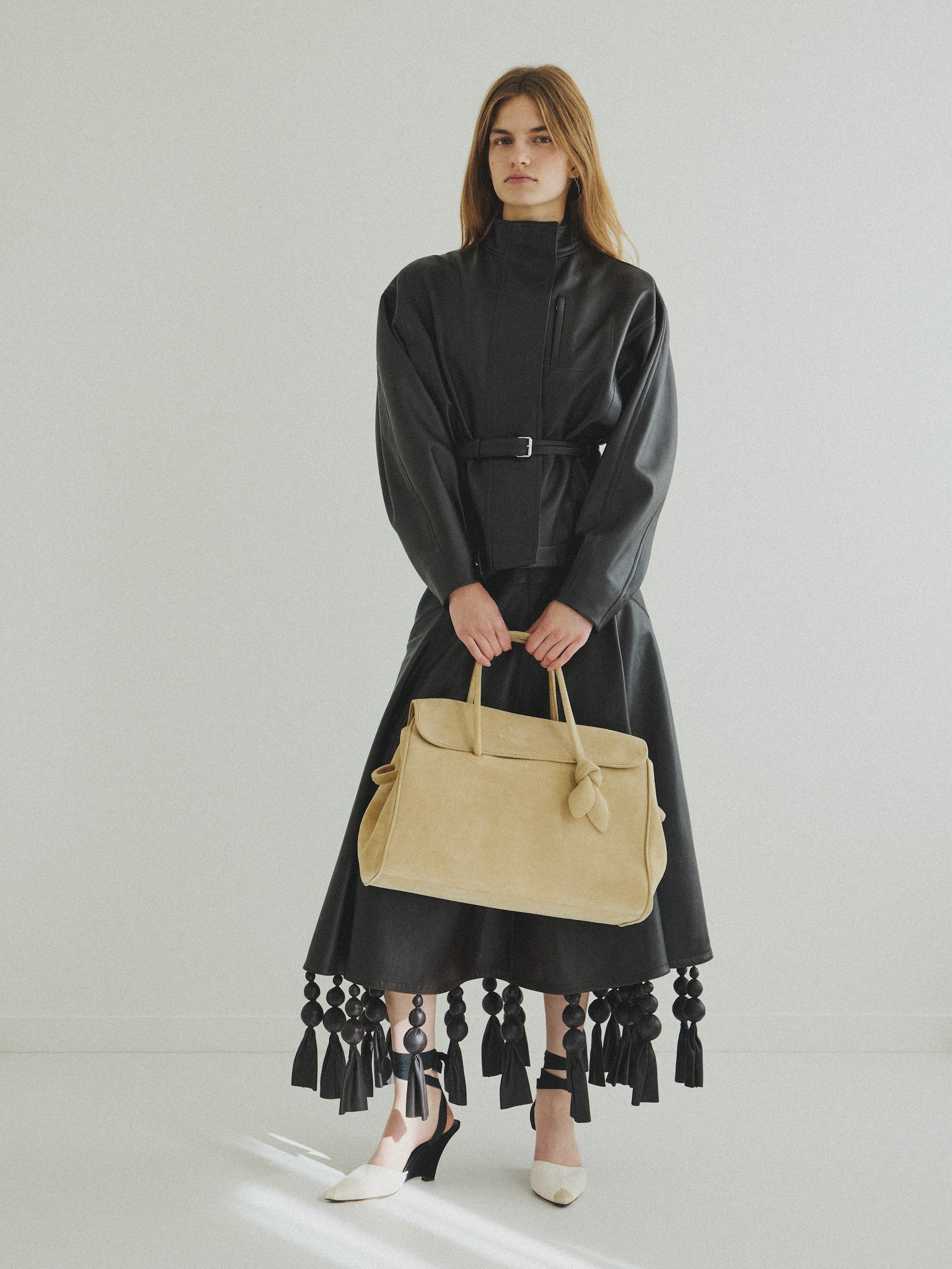 LA JUPE TRIANGLE CUIR