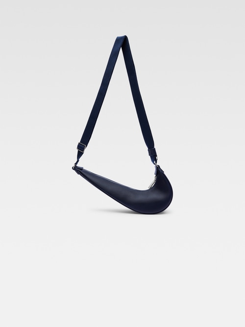 The Swoosh JACQUEMUS+NIKE bag